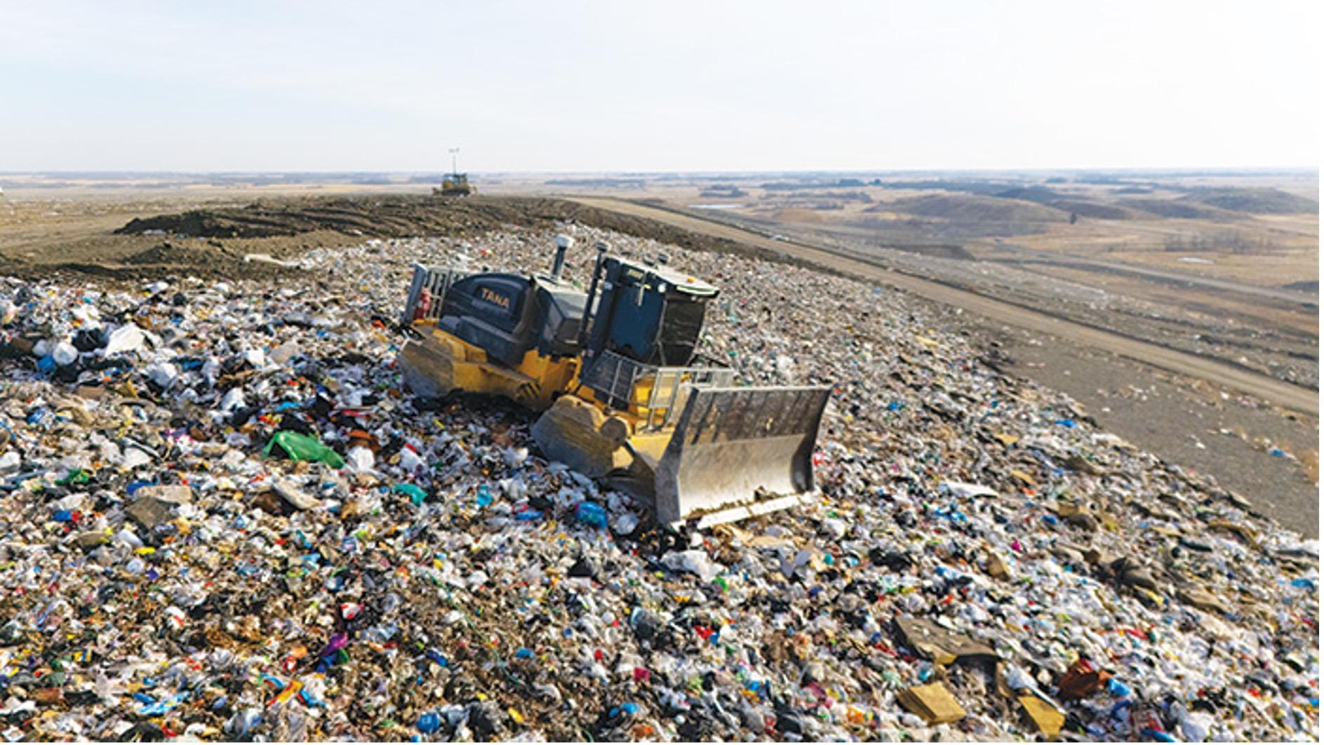 Tana landfill compactor Working face in Ryley, Alberta, Canada